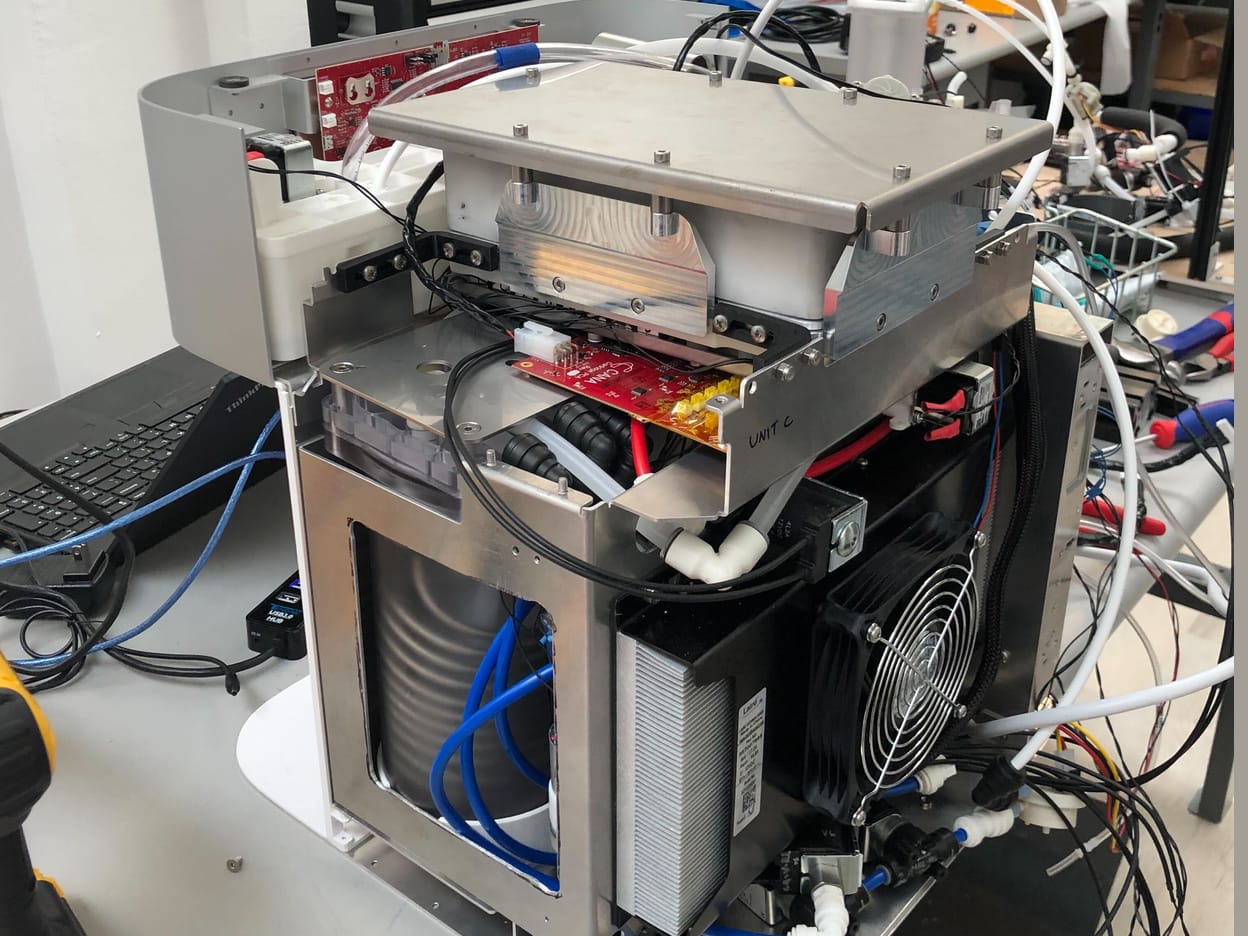 Cana engineering prototype with exposed dispensing and electronic components.